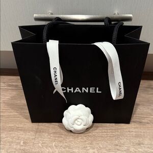 CHANEL Black Bag with White Camellia & Ribbon
